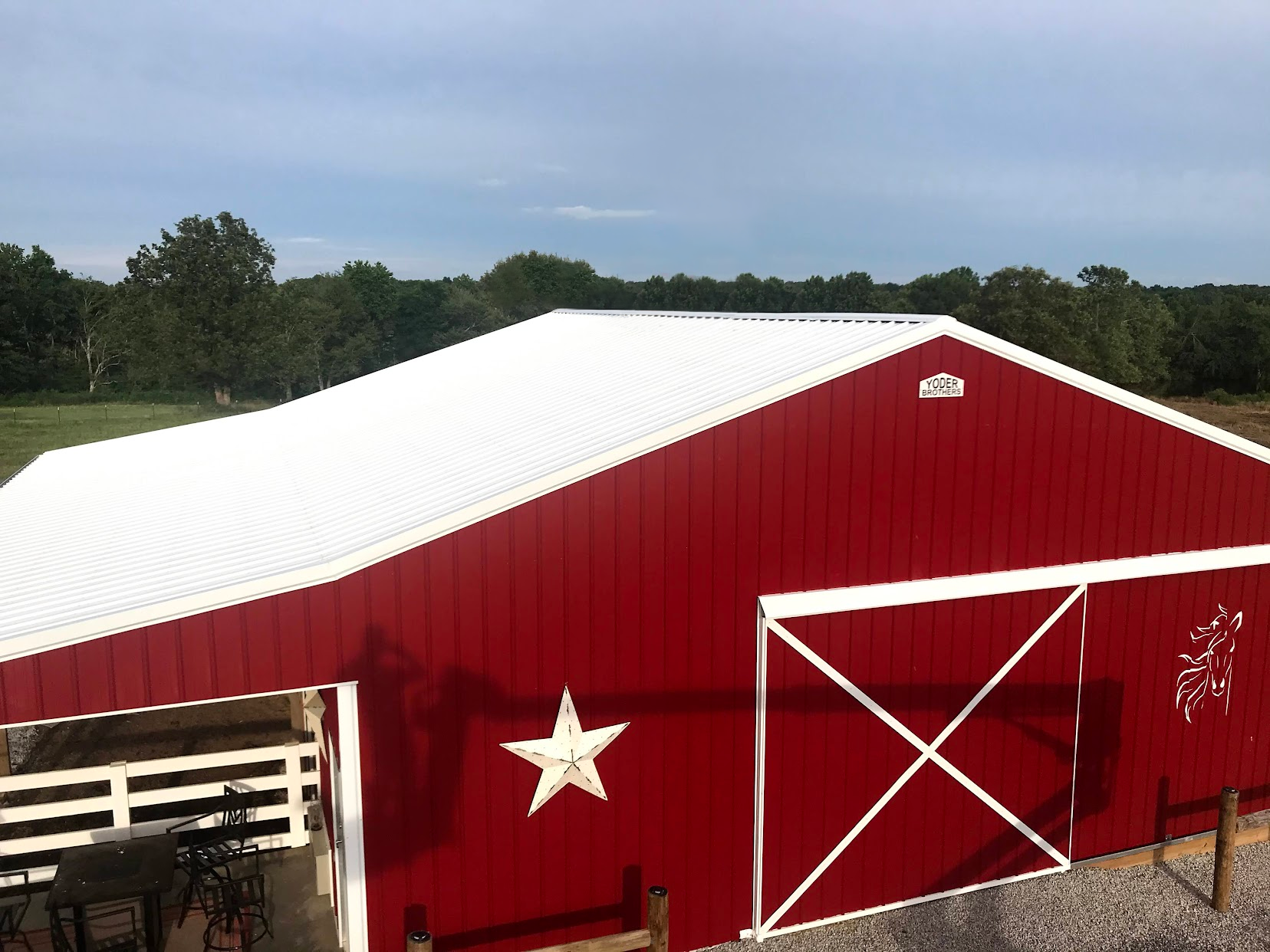 Red barn roofline without cupola